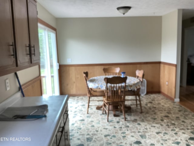 166 Stratford Rd, Harrogate, TN 37752 - dining room featuring a wainscoted wall and wooden walls
