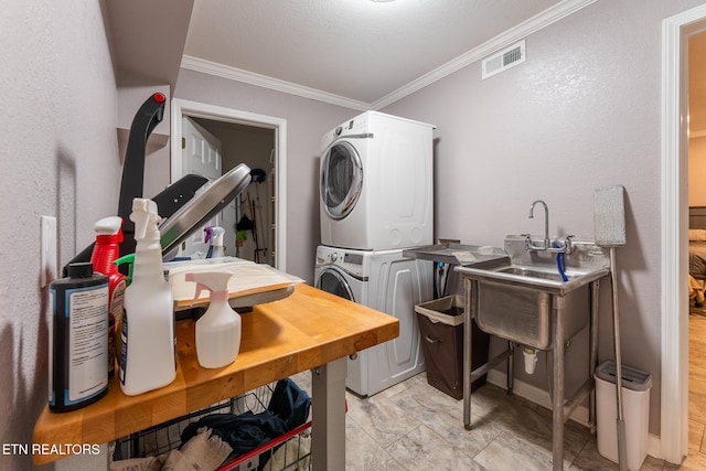 409 Turner Rd, Crossville, TN 38555 - washroom with stacked washer / drying machine and crown molding