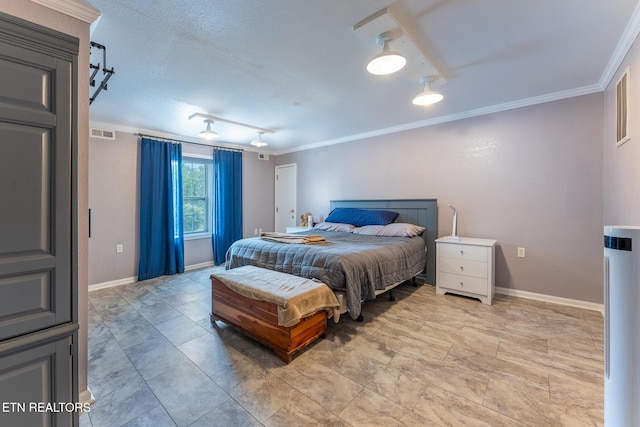 409 Turner Rd, Crossville, TN 38555 - bedroom with crown molding, baseboards, and rail lighting