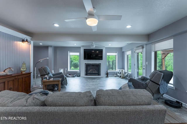 409 Turner Rd, Crossville, TN 38555 - living area with plenty of natural light, ceiling fan, baseboards, a fireplace, and recessed lighting