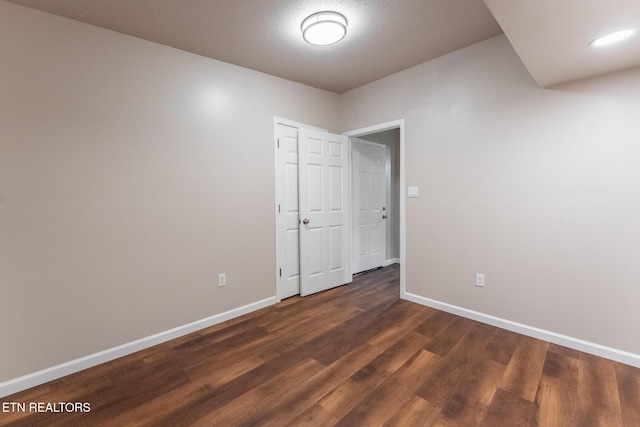 409 Turner Rd, Crossville, TN 38555 - spare room featuring baseboards and dark wood finished floors