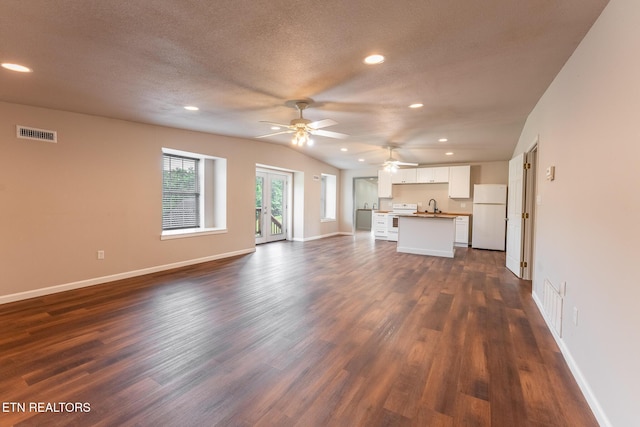 409 Turner Rd, Crossville, TN 38555 - unfurnished living room featuring ceiling fan, a sink, dark wood-style floors, recessed lighting, and baseboards