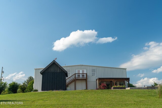 409 Turner Rd, Crossville, TN 38555 - view of pole building featuring a yard