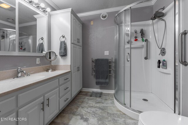 409 Turner Rd, Crossville, TN 38555 - full bathroom featuring ornamental molding, a stall shower, vanity, toilet, and baseboards