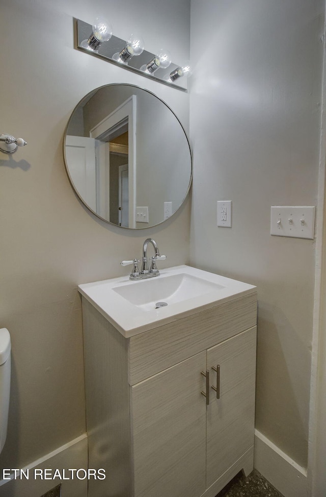 129 S Elmwood St, Knoxville, TN 37914 - half bath featuring vanity, toilet, and baseboards