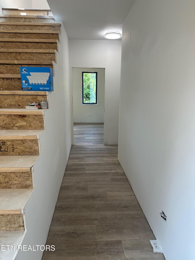 707 Powell Valley Shores Cir, Speedwell, TN 37870 - hallway featuring wood finished floors and stairway