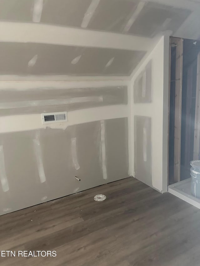 707 Powell Valley Shores Cir, Speedwell, TN 37870 - spare room featuring dark wood-type flooring