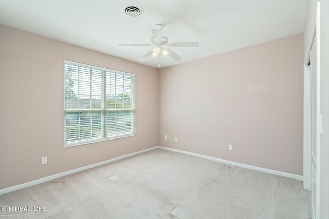 3241 Mountain Spring Way, Knoxville, TN 37917 - empty room with light carpet, ceiling fan, and baseboards