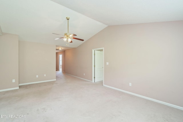 3241 Mountain Spring Way, Knoxville, TN 37917 - spare room featuring ceiling fan, baseboards, vaulted ceiling, and light carpet