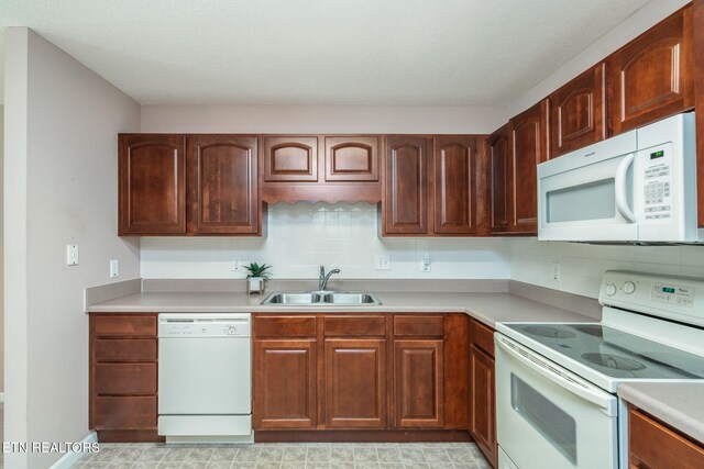 3241 Mountain Spring Way, Knoxville, TN 37917 - kitchen featuring white appliances, a sink, light countertops, and decorative backsplash