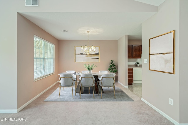 3241 Mountain Spring Way, Knoxville, TN 37917 - dining room with a chandelier, light carpet, and baseboards