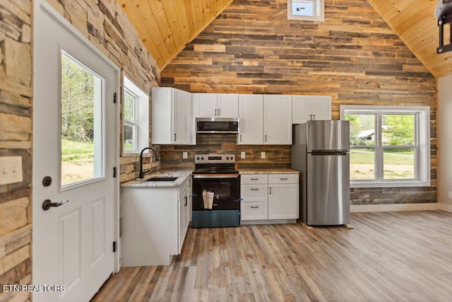 830 Hembree Hollow Rd, Townsend, TN 37882 - kitchen featuring stainless steel appliances, a sink, wooden ceiling, high vaulted ceiling, and white cabinets