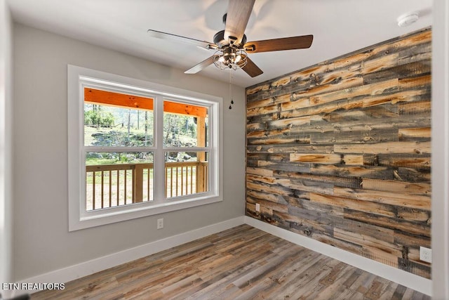 830 Hembree Hollow Rd, Townsend, TN 37882 - unfurnished room with a smoke detector, baseboards, ceiling fan, and wood finished floors