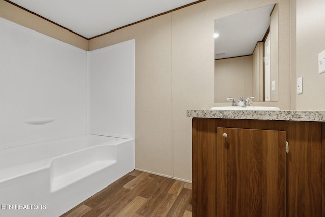 4001 Lilac Ave, Knoxville, TN 37914 - bathroom with vanity, wood finished floors, and crown molding