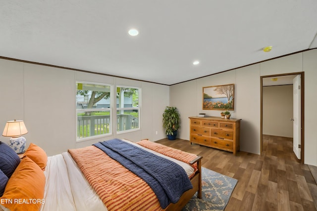4001 Lilac Ave, Knoxville, TN 37914 - bedroom with ornamental molding, wood finished floors, recessed lighting, and a decorative wall