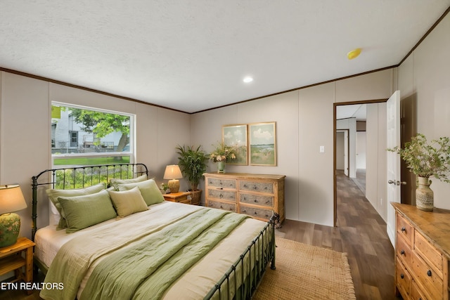 4001 Lilac Ave, Knoxville, TN 37914 - bedroom featuring wood finished floors, ornamental molding, a decorative wall, and recessed lighting