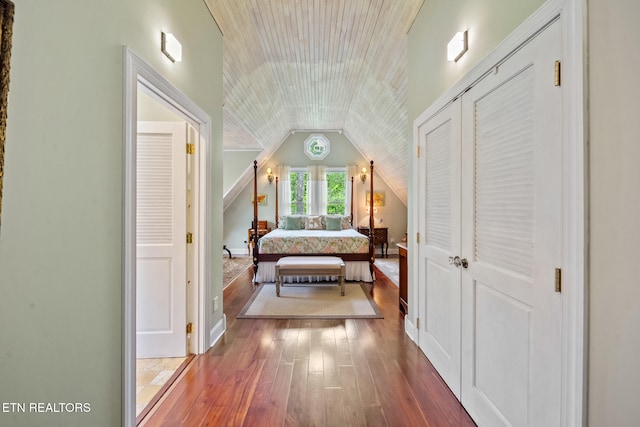 157 Wildcat Hollow Rd, New Tazewell, TN 37825 - bedroom featuring lofted ceiling, hardwood / wood-style flooring, a closet, and baseboards