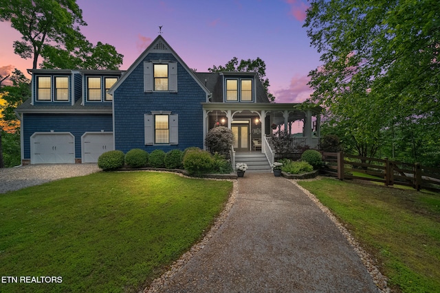 157 Wildcat Hollow Rd, New Tazewell, TN 37825 - view of front facade with asphalt driveway, covered porch, and a garage