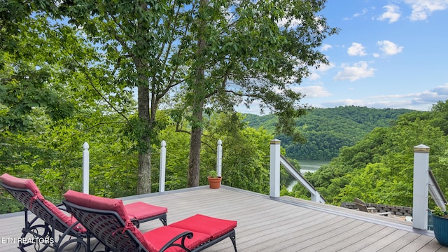 157 Wildcat Hollow Rd, New Tazewell, TN 37825 - wooden deck featuring a forest view