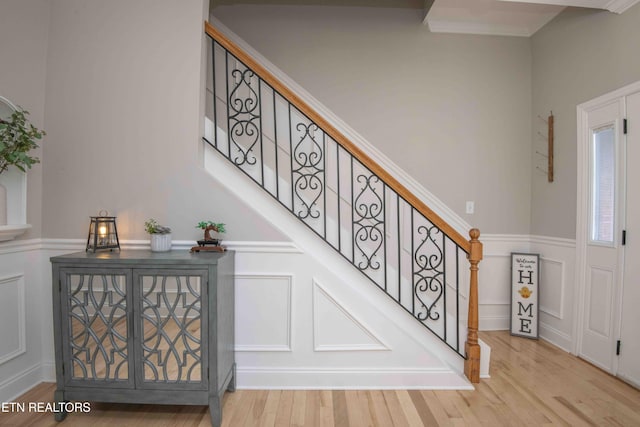160 Brentwood Pl, Lenoir City, TN 37772 - staircase featuring a decorative wall, wainscoting, and wood finished floors