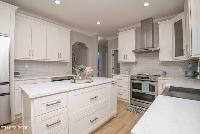 160 Brentwood Pl, Lenoir City, TN 37772 - kitchen featuring stainless steel appliances, wall chimney range hood, ornamental molding, recessed lighting, and backsplash