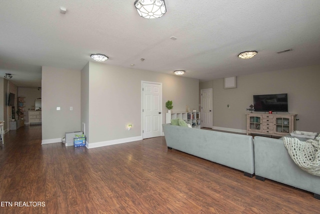 160 Brentwood Pl, Lenoir City, TN 37772 - living room featuring baseboards, wood finished floors, and a textured ceiling