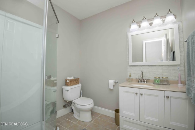 160 Brentwood Pl, Lenoir City, TN 37772 - bathroom featuring vanity, tile patterned floors, baseboards, toilet, and a shower stall