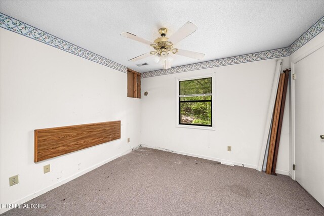 281 Moytoy Rd Unit 204, Crab Orchard, TN 37723 - carpeted spare room featuring a textured ceiling, a ceiling fan, and baseboards