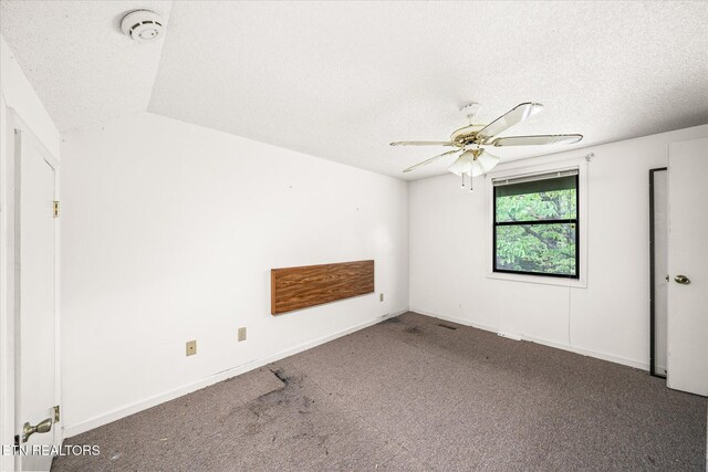 281 Moytoy Rd Unit 204, Crab Orchard, TN 37723 - unfurnished bedroom featuring a textured ceiling, carpet, ceiling fan, and baseboards