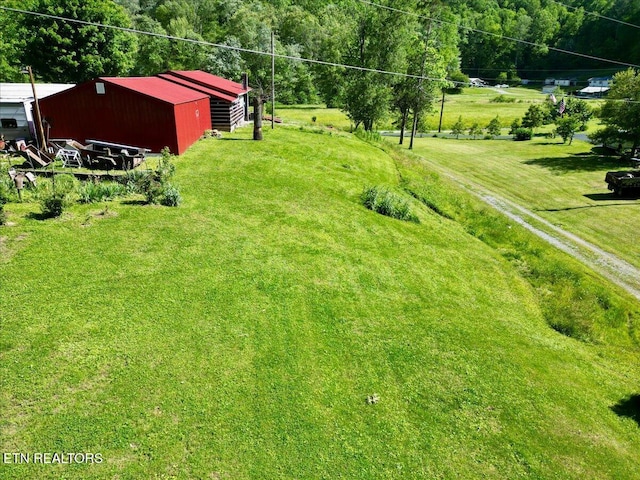 180 Stevenson Branch Rd, Middlesboro, KY 40965 - view of grassy yard with an outbuilding and an outdoor structure