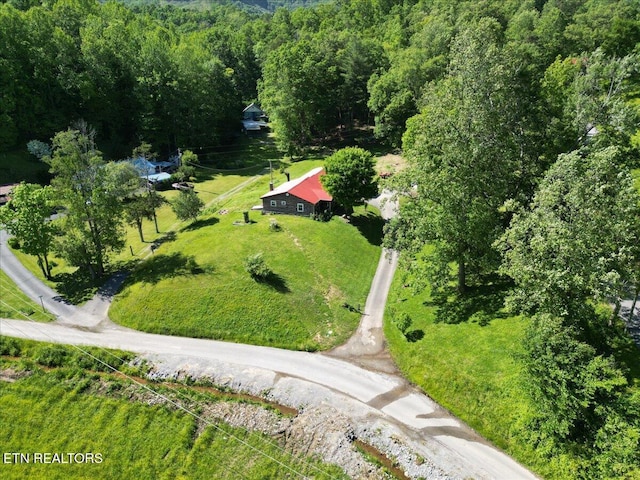 180 Stevenson Branch Rd, Middlesboro, KY 40965 - aerial view of property and surrounding area featuring a heavily wooded area
