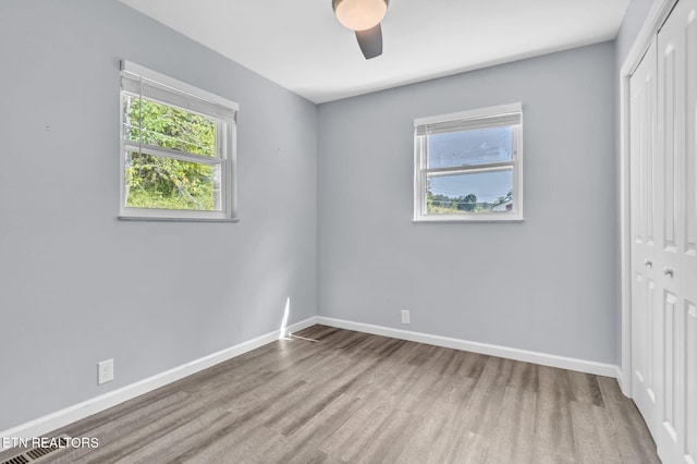 3694 Hickory Valley Rd, Maynardville, TN 37807 - unfurnished bedroom with a closet, wood finished floors, baseboards, and ceiling fan