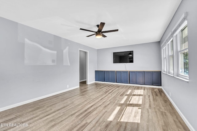 3694 Hickory Valley Rd, Maynardville, TN 37807 - empty room with wood finished floors, ceiling fan, and baseboards