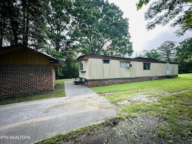 1238 Double S Rd, Dayton, TN 37321 - view of home's exterior featuring a lawn