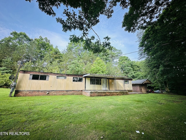 1238 Double S Rd, Dayton, TN 37321 - view of front facade with a front lawn