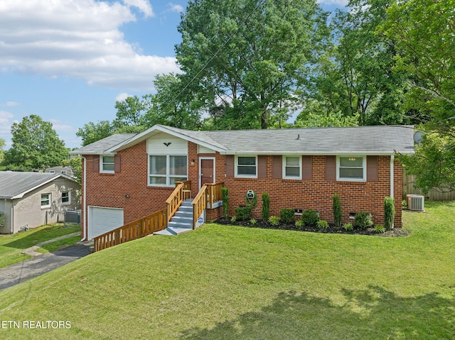 234 Bonnafield Dr, Hermitage, TN 37076 - single story home featuring central AC unit, brick siding, asphalt driveway, and an attached garage