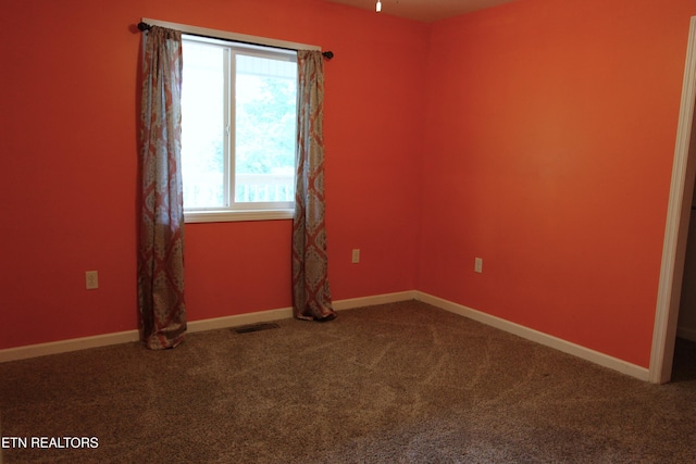 241 Oswego Rd, Jellico, TN 37762 - carpeted empty room featuring baseboards