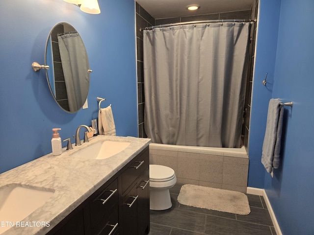 241 Oswego Rd, Jellico, TN 37762 - bathroom featuring tiled shower / bath, double vanity, toilet, and recessed lighting