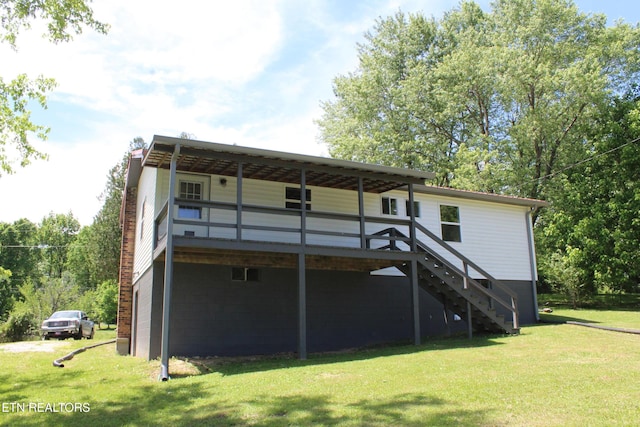 515 Silver Lake Dr, Jamestown, TN 38556 - back of house featuring a yard, stairway, a deck, and a chimney
