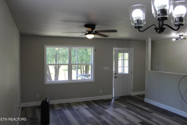 515 Silver Lake Dr, Jamestown, TN 38556 - entrance foyer featuring a chandelier, ceiling fan, dark wood-type flooring, and baseboards