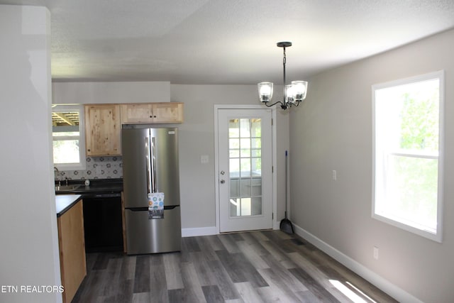 515 Silver Lake Dr, Jamestown, TN 38556 - kitchen with freestanding refrigerator, black dishwasher, dark wood-style floors, light brown cabinetry, and plenty of natural light