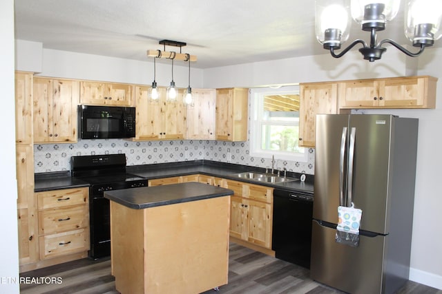 515 Silver Lake Dr, Jamestown, TN 38556 - kitchen with black appliances, light brown cabinets, a sink, and dark countertops