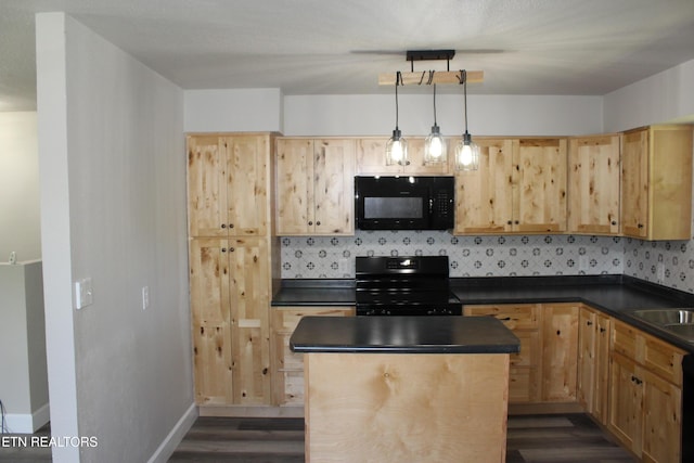 515 Silver Lake Dr, Jamestown, TN 38556 - kitchen featuring black microwave, range with electric cooktop, dark countertops, dark wood-type flooring, and a center island