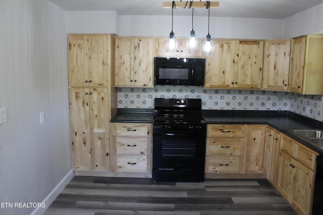 515 Silver Lake Dr, Jamestown, TN 38556 - kitchen featuring black appliances, light brown cabinetry, dark countertops, dark wood-style flooring, and baseboards