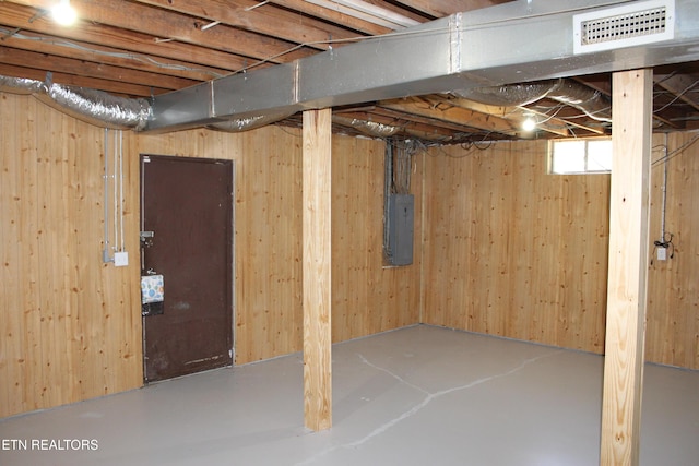 515 Silver Lake Dr, Jamestown, TN 38556 - basement with electric panel and wood walls