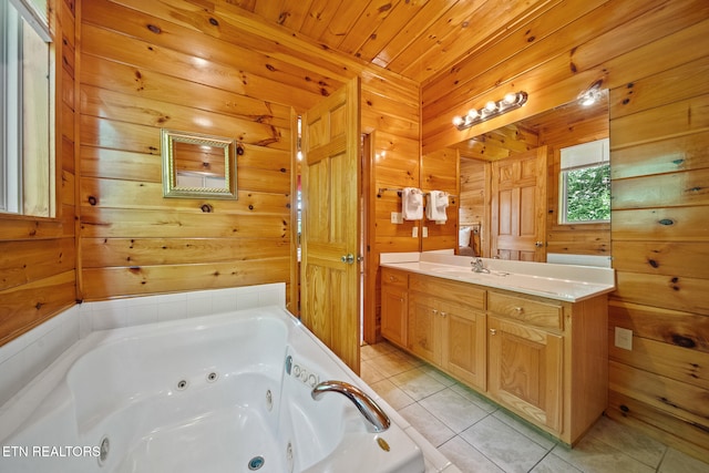 full bathroom featuring wooden walls, tile patterned floors, a whirlpool tub, vanity, and wooden ceiling