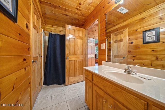 bathroom with wooden walls, vanity, tile patterned floors, a shower with curtain, and wood ceiling