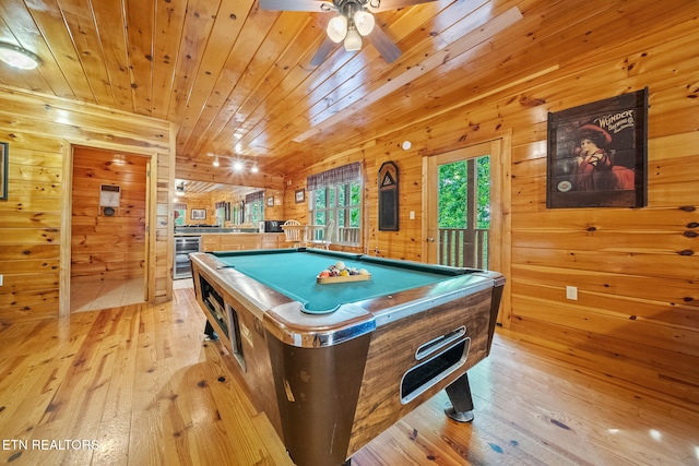 playroom featuring light wood finished floors, wood ceiling, pool table, wood walls, and ceiling fan