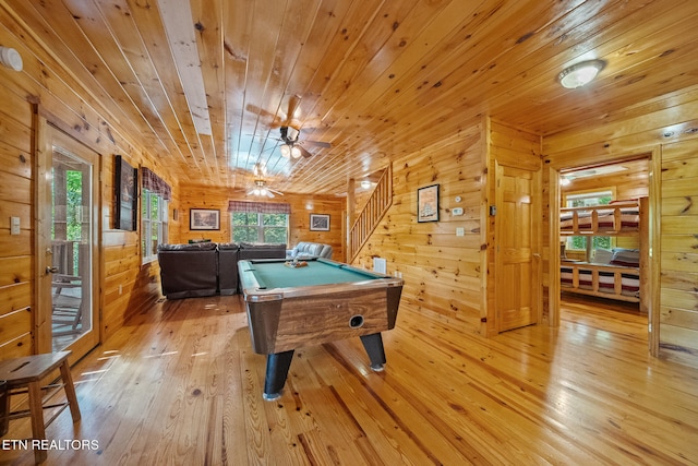 playroom with wooden walls, billiards, light wood-type flooring, wooden ceiling, and ceiling fan