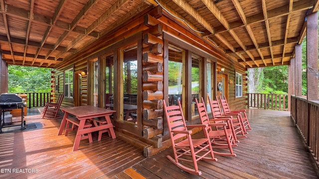 wooden deck featuring a porch